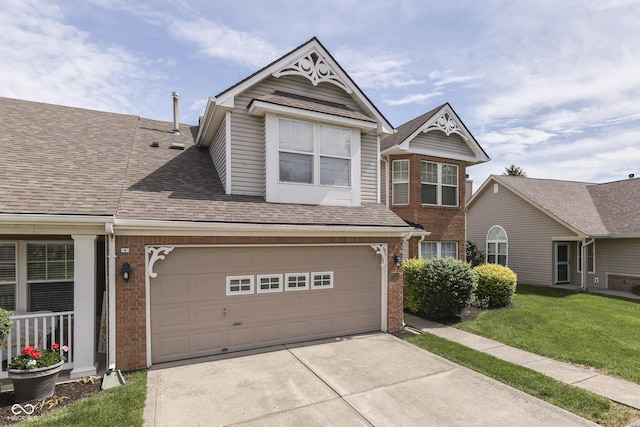 6542 E Edna Mills Dr, Camby, IN 46113 - view of front facade with brick siding, driveway, a front yard, and a shingled roof