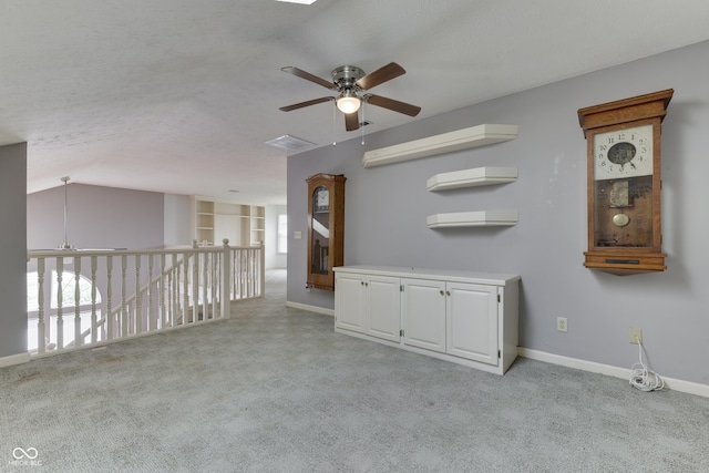 6542 E Edna Mills Dr, Camby, IN 46113 - empty room with ceiling fan, light carpet, baseboards, and vaulted ceiling