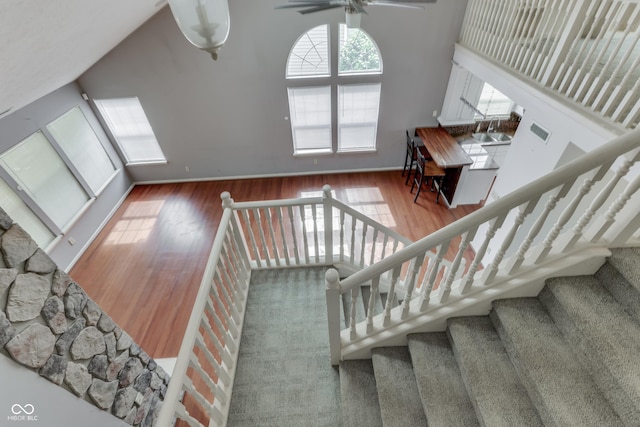 6542 E Edna Mills Dr, Camby, IN 46113 - staircase with wood-type flooring, ceiling fan, and baseboards