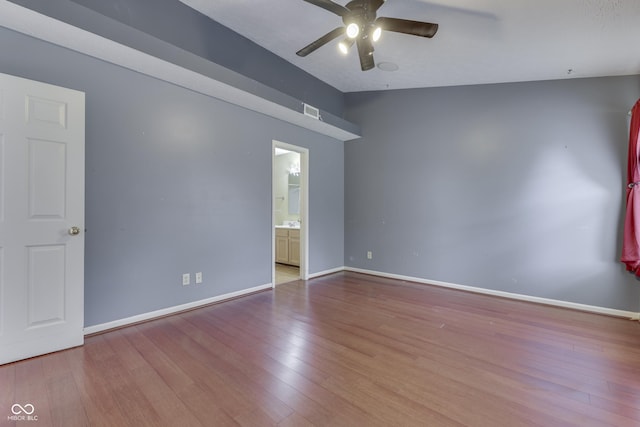 6542 E Edna Mills Dr, Camby, IN 46113 - empty room featuring ceiling fan, wood finished floors, and baseboards