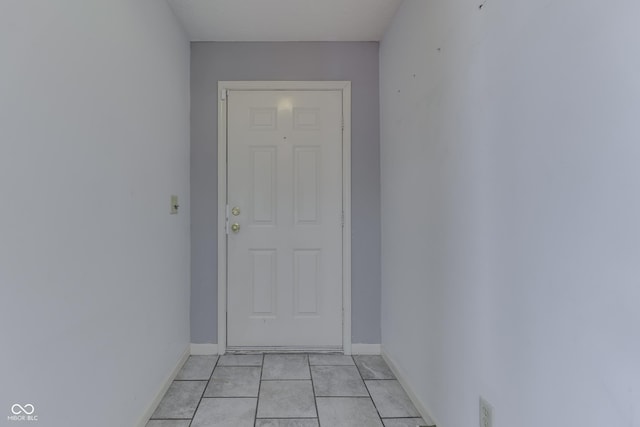 6542 E Edna Mills Dr, Camby, IN 46113 - doorway to outside featuring light tile patterned floors and baseboards