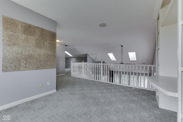 6542 E Edna Mills Dr, Camby, IN 46113 - additional living space with a skylight, carpet floors, lofted ceiling, and baseboards