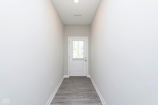 9604 Beckett St, Avon, IN 46123 - doorway to outside with baseboards and wood finished floors