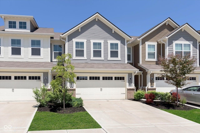 9604 Beckett St, Avon, IN 46123 - townhome / multi-family property with concrete driveway and a garage
