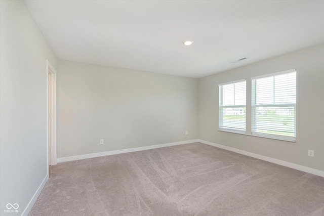 9604 Beckett St, Avon, IN 46123 - empty room with light colored carpet, baseboards, and recessed lighting