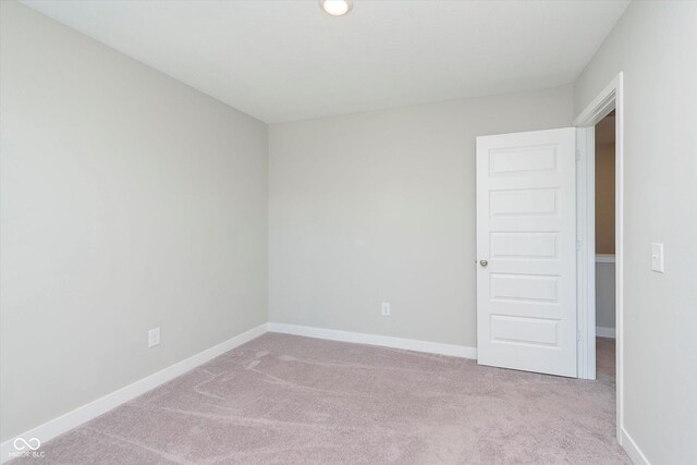 9604 Beckett St, Avon, IN 46123 - empty room featuring carpet floors and baseboards