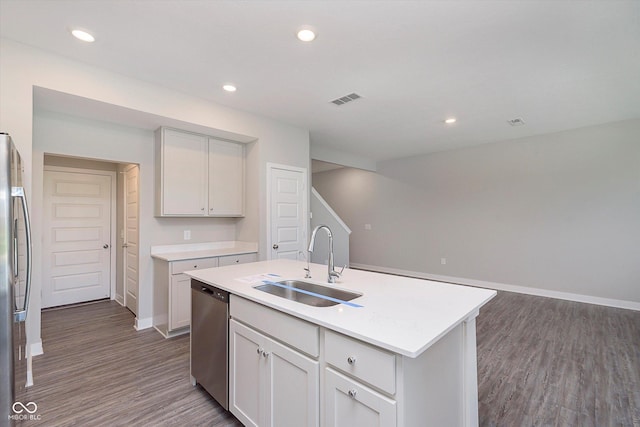9604 Beckett St, Avon, IN 46123 - kitchen featuring appliances with stainless steel finishes, a sink, dark wood-style floors, baseboards, and light countertops