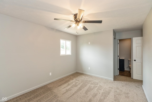521 Sunset Dr, Edinburgh, IN 46124 - empty room with light colored carpet, a ceiling fan, and baseboards
