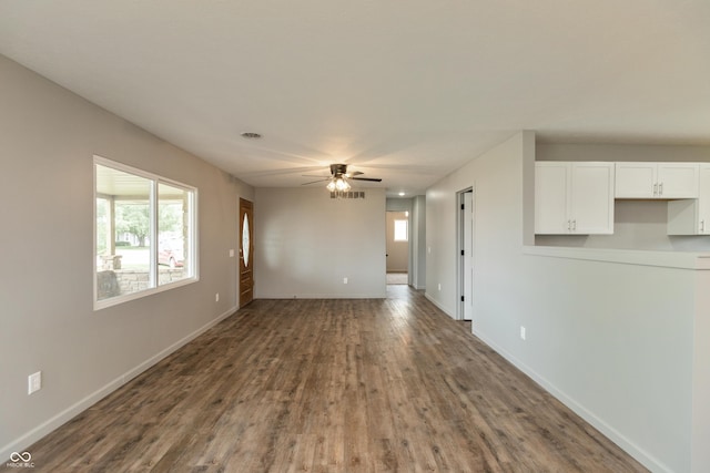 521 Sunset Dr, Edinburgh, IN 46124 - unfurnished living room with dark wood finished floors, ceiling fan, and baseboards