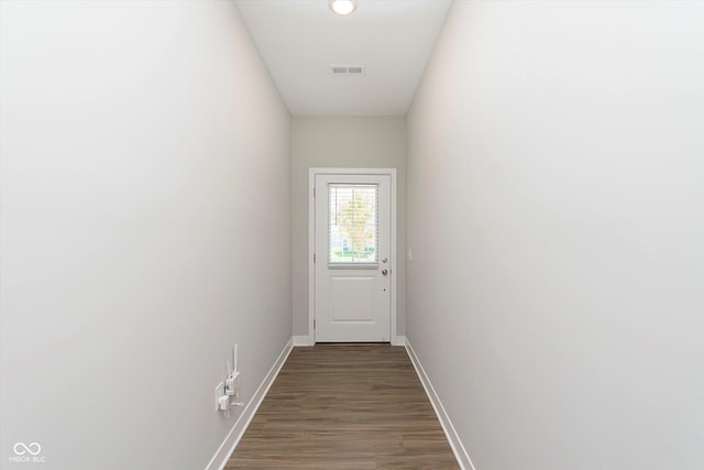 1280 Newton St, Avon, IN 46123 - doorway with baseboards and dark wood-style flooring