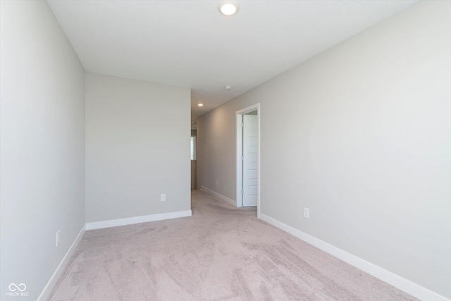 1280 Newton St, Avon, IN 46123 - empty room with light colored carpet, recessed lighting, and baseboards
