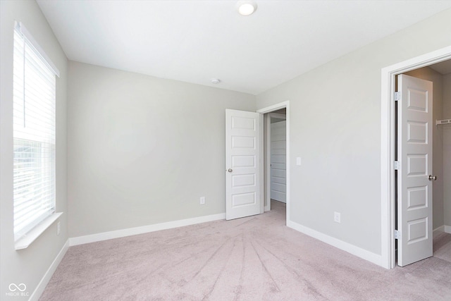 1280 Newton St, Avon, IN 46123 - unfurnished bedroom featuring multiple windows, carpet, and baseboards