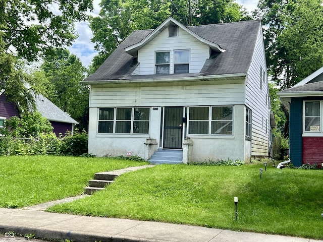 1137 W 34th St, Indianapolis, IN 46208 - bungalow-style house with a front yard
