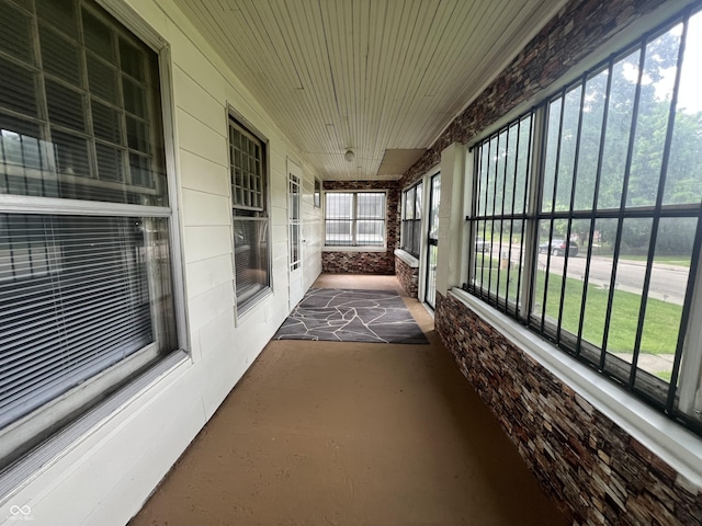 1137 W 34th St, Indianapolis, IN 46208 - unfurnished sunroom with wood ceiling and finished concrete flooring