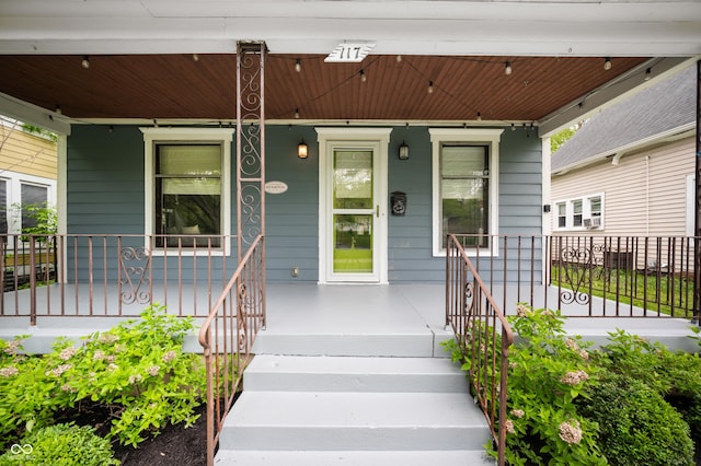 117 S Spencer Ave, Indianapolis, IN 46219 - doorway to property featuring a porch