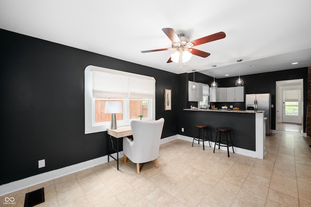 117 S Spencer Ave, Indianapolis, IN 46219 - dining area featuring healthy amount of natural light, a ceiling fan, baseboards, and recessed lighting