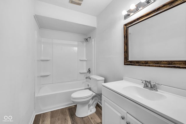 6017 Bluff Crest Ct, Indianapolis, IN 46217 - full bathroom with wood finished floors, toilet, vanity, and shower / bath combination