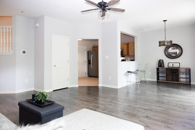 8317 Pine Branch Ln, Indianapolis, IN 46234 - living room with a ceiling fan and wood finished floors