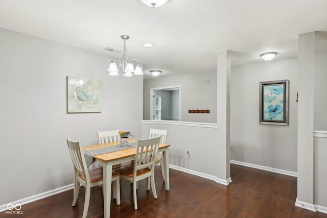 2911 W Hawanian Ln, Monrovia, IN 46157 - dining room with wood finished floors, a chandelier, and baseboards
