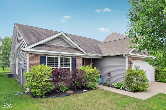 2911 W Hawanian Ln, Monrovia, IN 46157 - view of front of home with a garage, a front lawn, a shingled roof, and brick siding