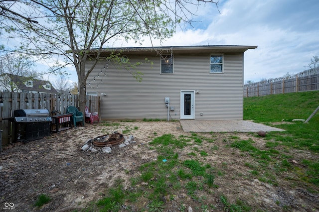 917 Timothy Ct, Bloomington, IN 47403 - back of house with a patio and a fire pit