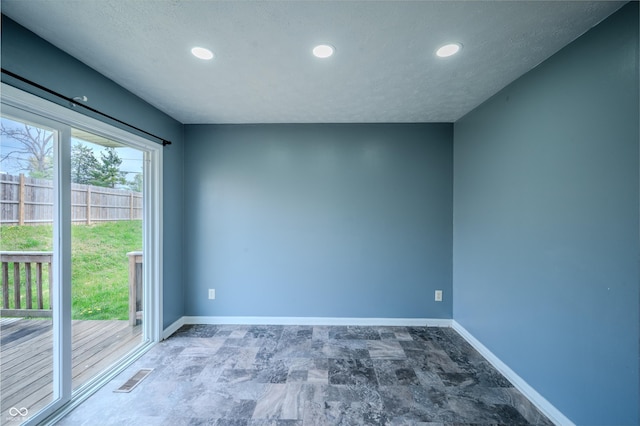 917 Timothy Ct, Bloomington, IN 47403 - unfurnished room featuring recessed lighting, baseboards, and a textured ceiling