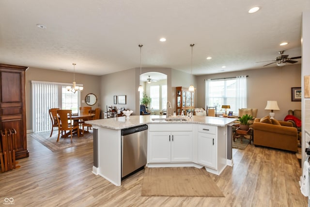 9166 Lieven St, Avon, IN 46123 - kitchen with a sink, dishwasher, ceiling fan, open floor plan, and light wood finished floors