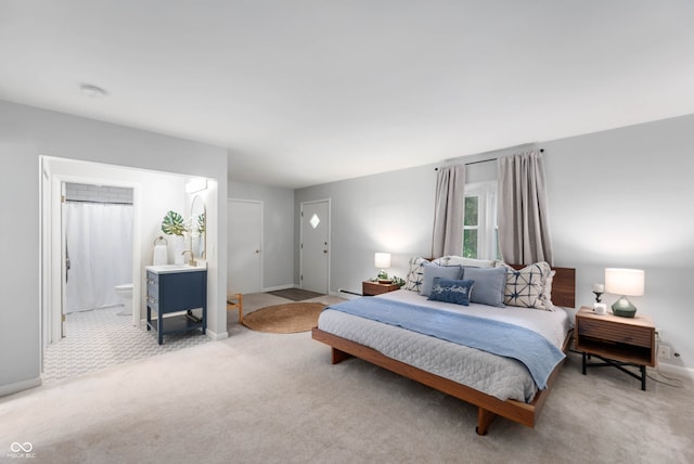 2120 Wynnedale Rd, Indianapolis, IN 46228 - bedroom with carpet, baseboard heating, and ensuite bathroom