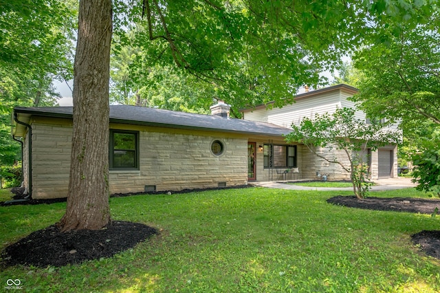 2120 Wynnedale Rd, Indianapolis, IN 46228 - view of front of house with an attached garage, stone siding, a front lawn, and a chimney