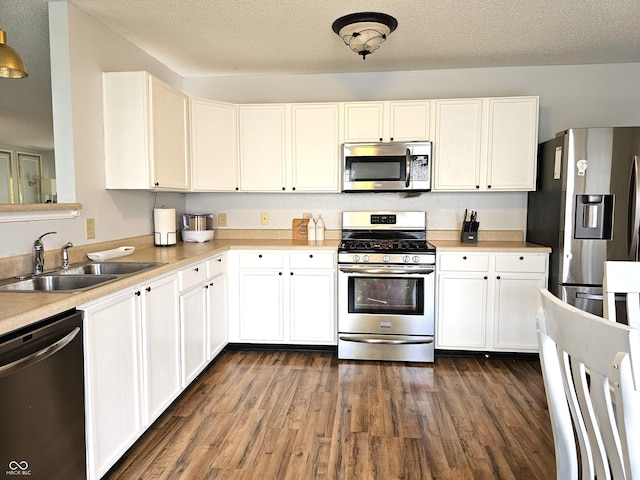 10836 Zimmerman Ln, Indianapolis, IN 46231 - kitchen with appliances with stainless steel finishes, a sink, and light countertops
