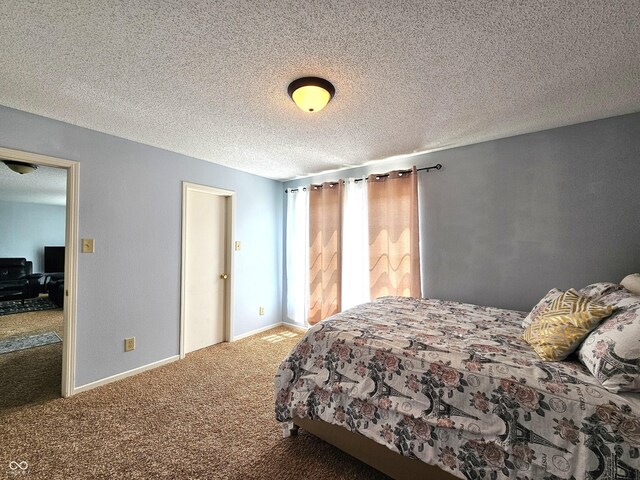 10836 Zimmerman Ln, Indianapolis, IN 46231 - carpeted bedroom with a textured ceiling