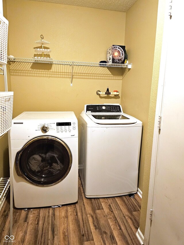 10836 Zimmerman Ln, Indianapolis, IN 46231 - washroom with separate washer and dryer and wood finished floors