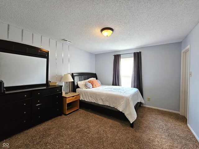 10836 Zimmerman Ln, Indianapolis, IN 46231 - carpeted bedroom featuring baseboards and a textured ceiling