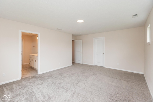 3980 Railhead Ave, Westfield, IN 46074 - unfurnished bedroom with light carpet, baseboards, recessed lighting, and connected bathroom