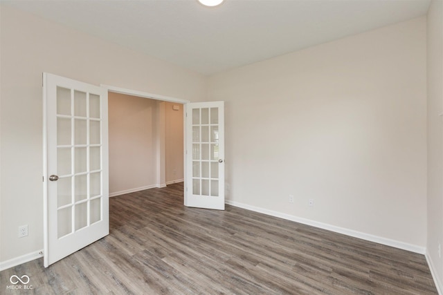 3980 Railhead Ave, Westfield, IN 46074 - empty room featuring french doors, wood finished floors, and baseboards