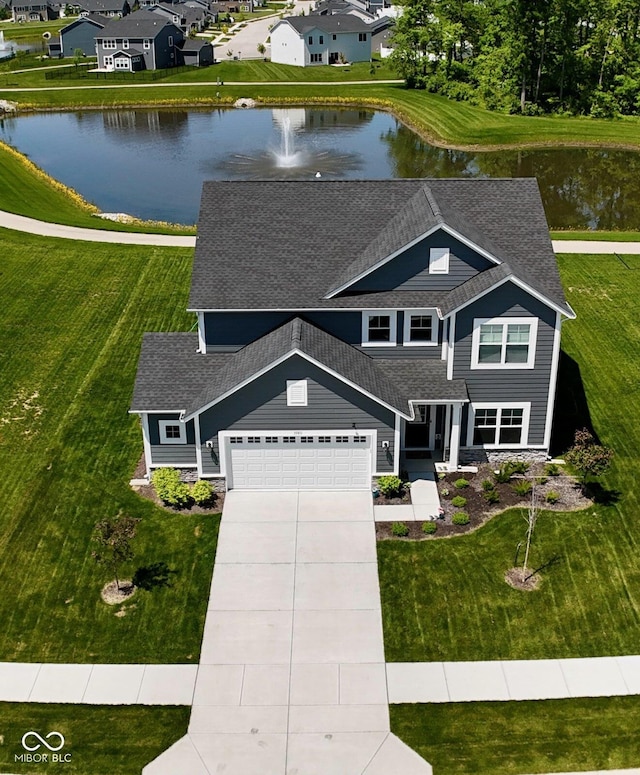 3980 Railhead Ave, Westfield, IN 46074 - view of front of home featuring concrete driveway, a water view, and a shingled roof