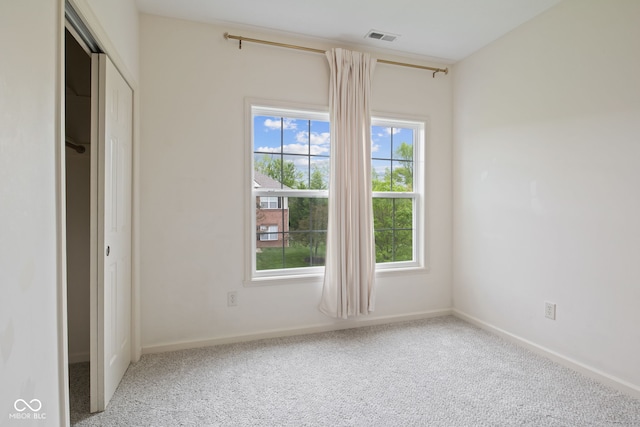 4261 Washington Blvd, Plainfield, IN 46168 - unfurnished bedroom featuring baseboards, carpet, and a closet