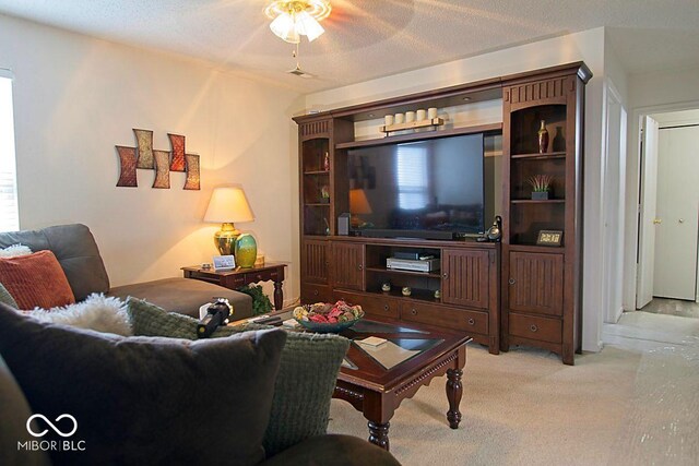 7737 Wolfgang Pl, Indianapolis, IN 46239 - living room with carpet flooring and a ceiling fan