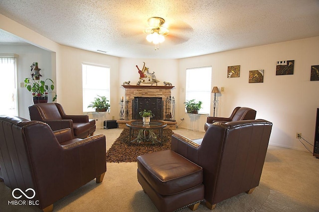 7737 Wolfgang Pl, Indianapolis, IN 46239 - living room featuring light colored carpet, plenty of natural light, and a textured ceiling
