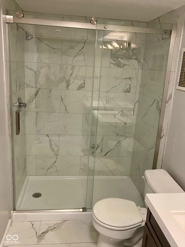 1150 Canterbury Ct Apt D, Indianapolis, IN 46260 - full bathroom with toilet, marble finish floors, vanity, and a shower stall