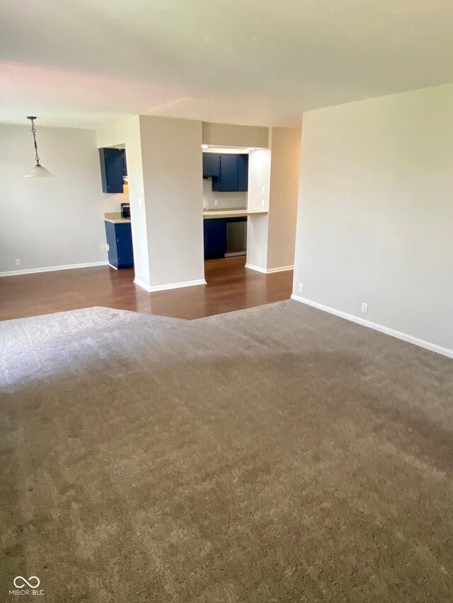 1150 Canterbury Ct Apt D, Indianapolis, IN 46260 - spare room with dark carpet and baseboards