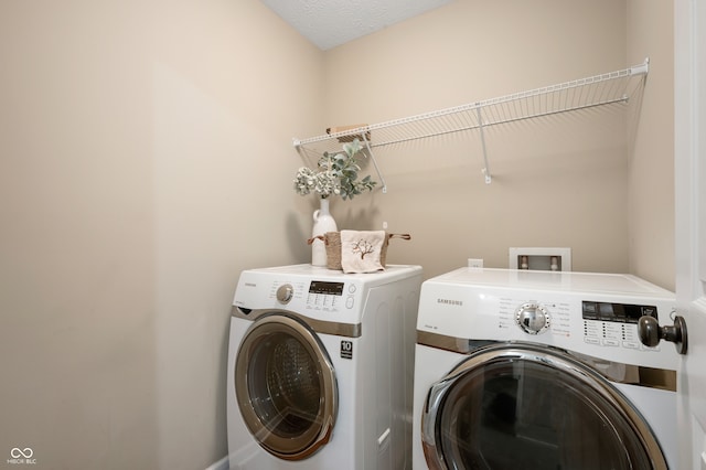 12331 Chiseled Stone Dr, Fishers, IN 46037 - laundry room featuring washer and clothes dryer