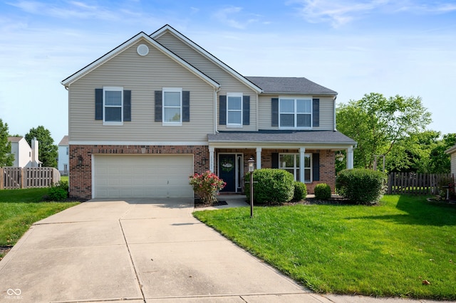 12331 Chiseled Stone Dr, Fishers, IN 46037 - view of front of house with a garage, brick siding, driveway, and a porch