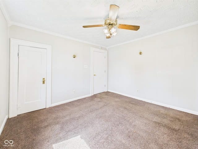 903 W 22nd St, Anderson, IN 46016 - carpeted empty room featuring crown molding, baseboards, and a ceiling fan