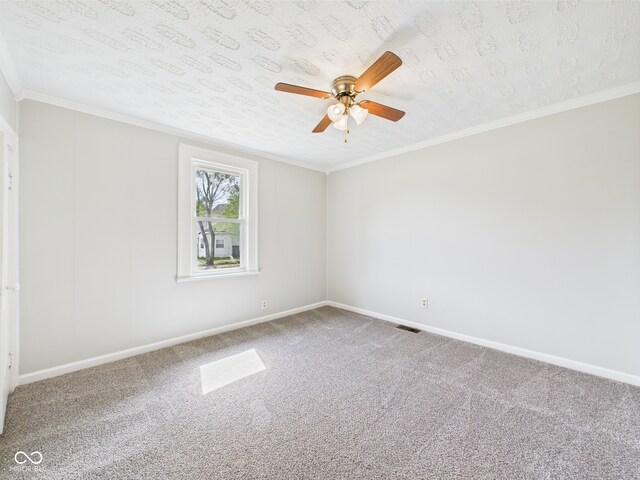 903 W 22nd St, Anderson, IN 46016 - unfurnished room with carpet, baseboards, a ceiling fan, and ornamental molding