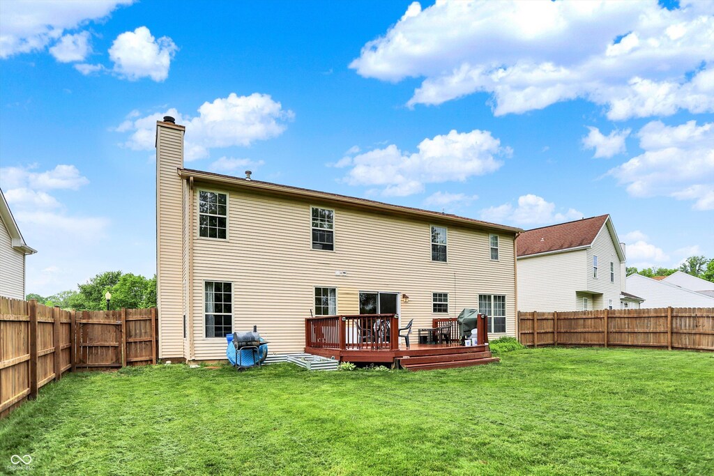 6609 Fountain Springs Blvd, Indianapolis, IN 46236 - rear view of house with a chimney and a deck