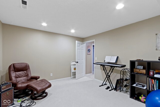 sitting room with carpet, recessed lighting, and baseboards