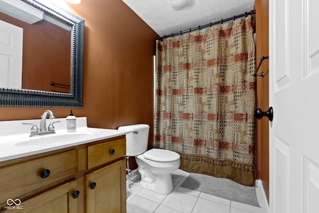 full bathroom featuring tile patterned floors, a textured ceiling, toilet, vanity, and curtained shower