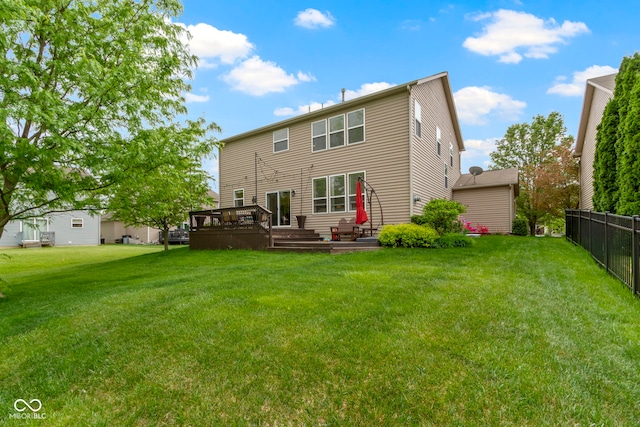 back of property with a deck