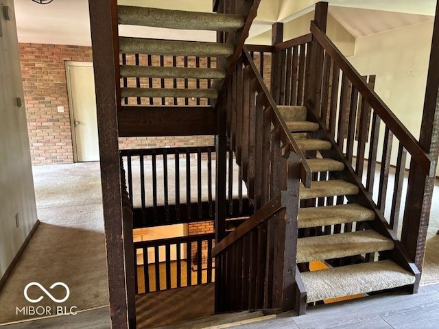 310 S Shady Ln, Muncie, IN 47304 - staircase with brick wall